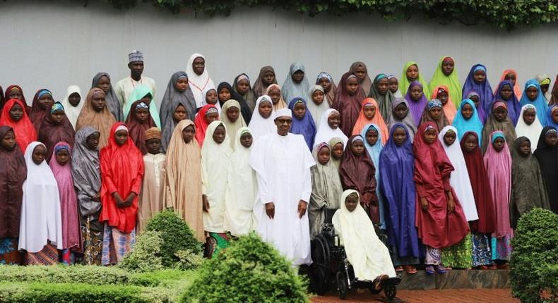 In March, President Muhammadu Buhari posed with schoolgirls who had been kidnapped by Boko Haram and then released. The insurgency in northern Nigeria is continuing, despite Buhari's claim to have rolled the jihadists back