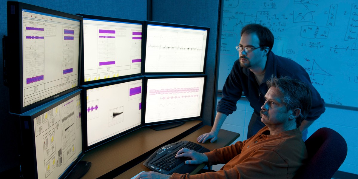 Department of Homeland Security (DHS) researchers use advanced modeling and simulation equipment as they work on the DHS Control Systems Security Program (CSSP).