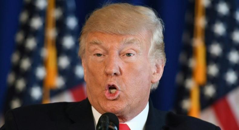 US President Donald Trump speaks to the press about protests in Charlottesville on August 12, 2017, at Trump National Golf Club in Bedminster, New Jersey