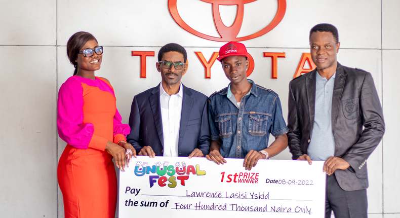 L-R  Convener of Unusual Fest, Alex Unusual; General Manager at Toyota Nigeria Limited, Bunmi Onafowokan; winner of Own-the-Dream Competition, Lawrence Lasisi Yskid; and Head of Services at Toyota Nigeria Limi
