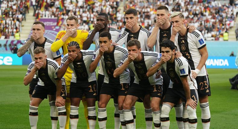 The German team pose for a photo before the game with their hands over their mouths suggesting they have been gagged during the FIFA World Cup on November 23, 2022.