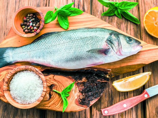 131947_stockphotoseabassfishonthegraphiteboard334209818