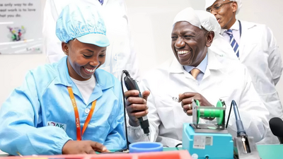 President William Ruto is shown how the smart phones are made at the East Africa Device Assembly Kenya factory in Athi River, Machakos during its launch on October 30, 2023.