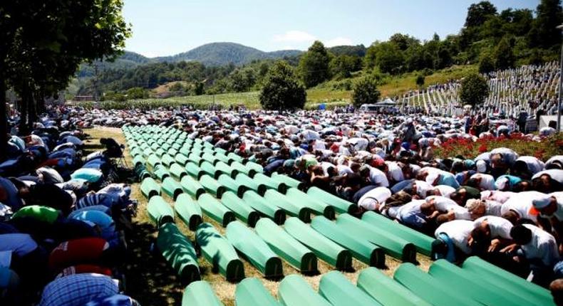 Srebrenica buries 127 victims of massacre, Serbs absent over genocide denial