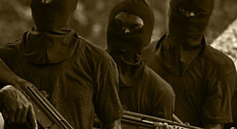 Unknown gunmen in face mask - Illustration purpose