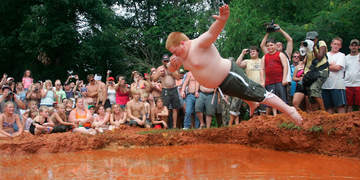 Gebby Lehman participates and won first place in the mudpit belly flop at the 2007 Summer Redneck Games in East Dublin, Georgia, July 7, 2007. The Redneck Games began as a joke in response to the 1996 Olympic Games in Atlanta.