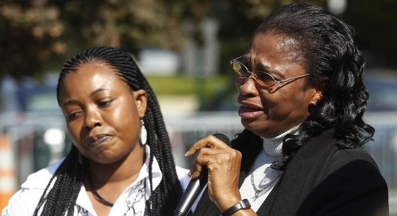 FILE PHOTO - Plaintiff Esther Kiobel (R) speaks during a protest against Royal Dutch Shell Petroleum in front of the U.S. Supreme Court in Washington October 1, 2012. 