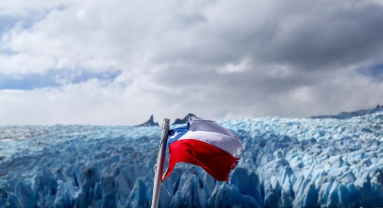 Chile's flag flies near a glacier at a national park in Patagonia, where Argentina recently claimed a glacier field along the countries' joint border