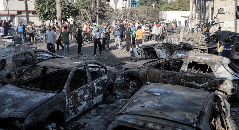 A general view of the wreckage of vehicles after Al-Ahli Baptist Hospital was hit in Gaza City, Gaza on October 18, 2023.Photo by Belal Khaled/Anadolu via Getty Images