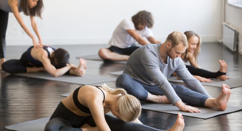 The cafe, which is located in the United Kingdom, said it was actually just students meditating in a yoga class (not pictured). fizkes via Getty Images