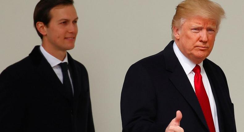 U.S. President Donald Trump gives a thumbs-up as he and White House Senior Advisor Jared Kushner depart the White House in Washington, U.S., March 15, 2017.