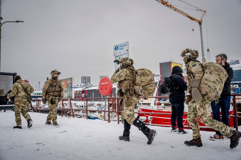 Danish soldiers disembark at the port in Nuuk