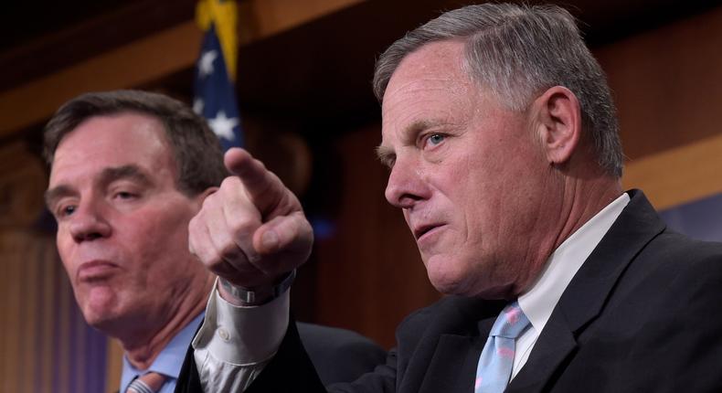 Senate Intelligence Committee Chairman Sen. Richard Burr, R-N.C., right, and the committee's Vice Chairman Sen. Mark Warner, D-Va. meet with reporters on Capitol Hill in Washington, Wednesday, March 29, 2017.