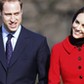 Britain's Prince William and his fiancee Kate Middleton smile during a visit to St. Andrews Universi