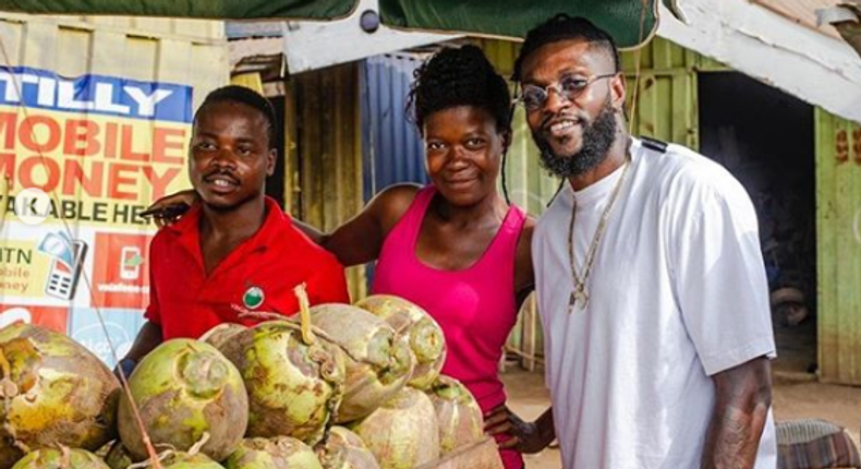 ‘God bless your hustle’ – Adebayor inspires couple selling coconut on the street