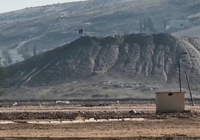 Zastava Islamske države koja se viorila iznad Kobane