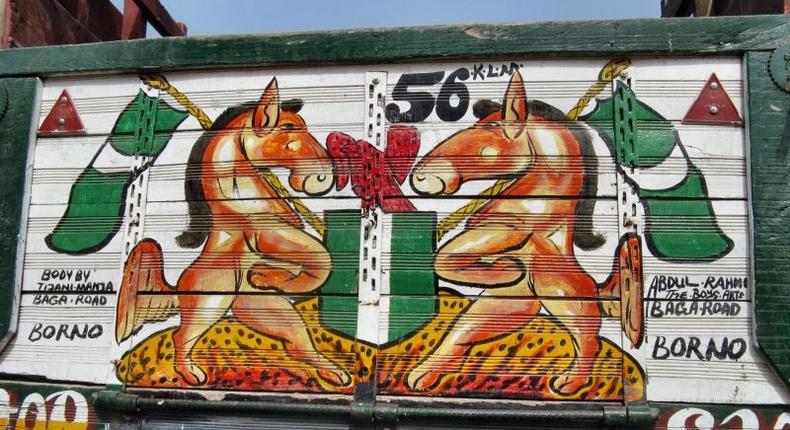 A drawing of the Nigerian coat of arms on a truck