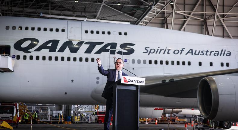 Alan Joyce, CEO of Qantas, speaks at an event.