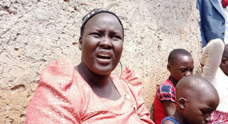 Phionah Likicho, late Ronald Busingye's widow, and her children