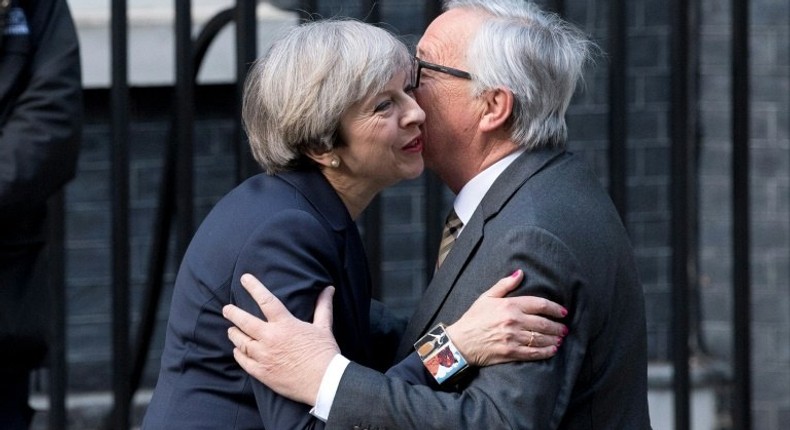 Kiss, off: European Commission President, Jean-Claude Juncker embraces British Prime Minister Theresa May outside 10 Downing Street in April. There are fears that the Brexit negotiations could be much less friendly.