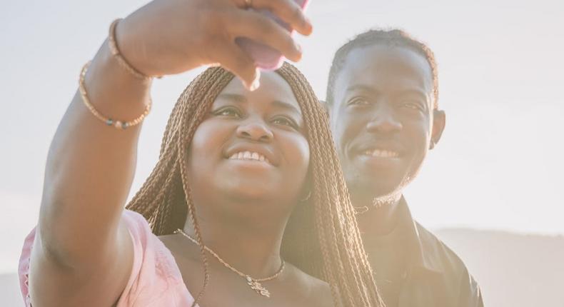 Couple taking a selfie [Image credit: PNW Production]