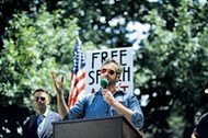 Mike Cernovich speaks during a rally about free speech outside of the White House in Washington