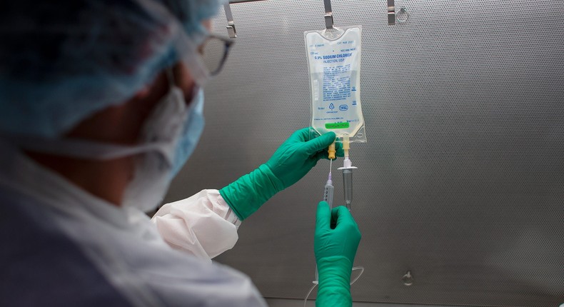 Dan Pelletier, a pharmacy technician specialist at Maine Medical Center, demonstrates the process of preparing antibodies used to treat COVID19 patients.
