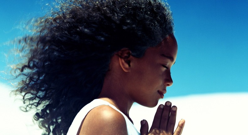 Praying black woman