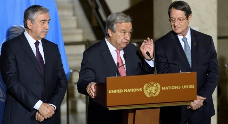 UN Secretary-General Antonio Guterres (C), pictured in January 2017, has arranged for rival Cypriot leaders, Turkish Mustafa Akinci (L) and Greek Cypriot President Nicos Anastasiades (R), to meet in New York this weekend