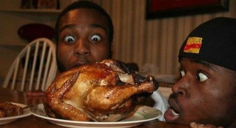 ___7856575___2018___1___17___13___Black-men-eating-chicken