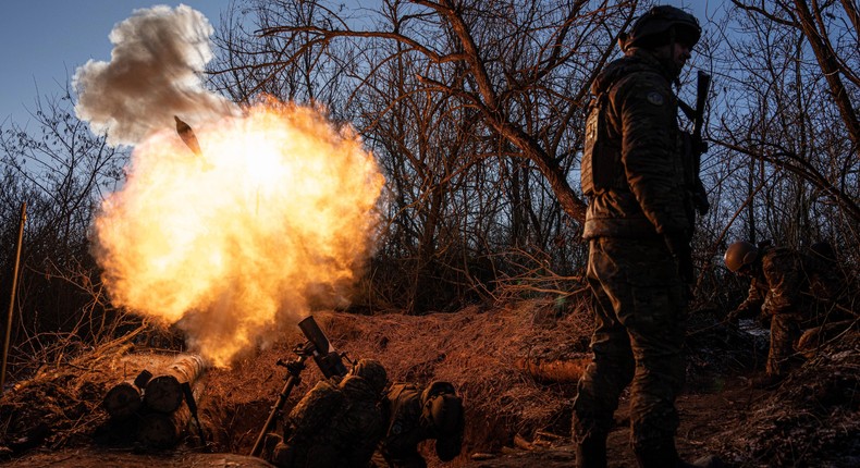 Ukrainian servicemen fire a 120mm mortar towards Russian positions at the frontline near Bakhmut, Donetsk region, Ukraine, Wednesday, Jan. 11, 2023.AP Photo/Evgeniy Maloletka, File