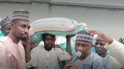 Former Zamfara Commissioner for Education, Alhaji Ibrahim Danmalikin-Gidangoga representing Lawmaker-elect for Bungudu/Maru Federal Constituency, Alhaji Abdulmalik Zubairu during the inauguration of sale and distribution of subsidised fertilizer to farmers from 21 Wards of Bungudu and Maru local government areas of the state. [NAN]