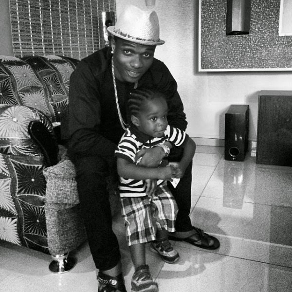 Wizkid and his first son Boluwatife in 2014