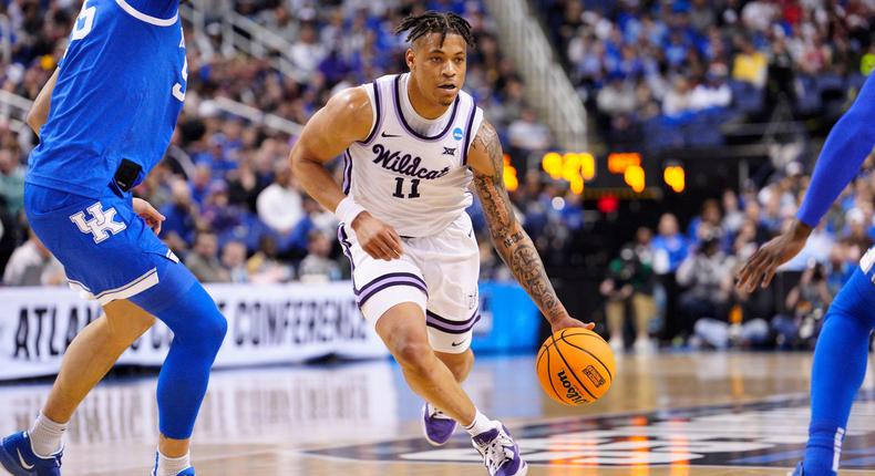 Keyontae Johnson dribbles through the Kentucky defense during the second round of the 2023 NCAA tournament.Jacob Kupferman/Getty Images