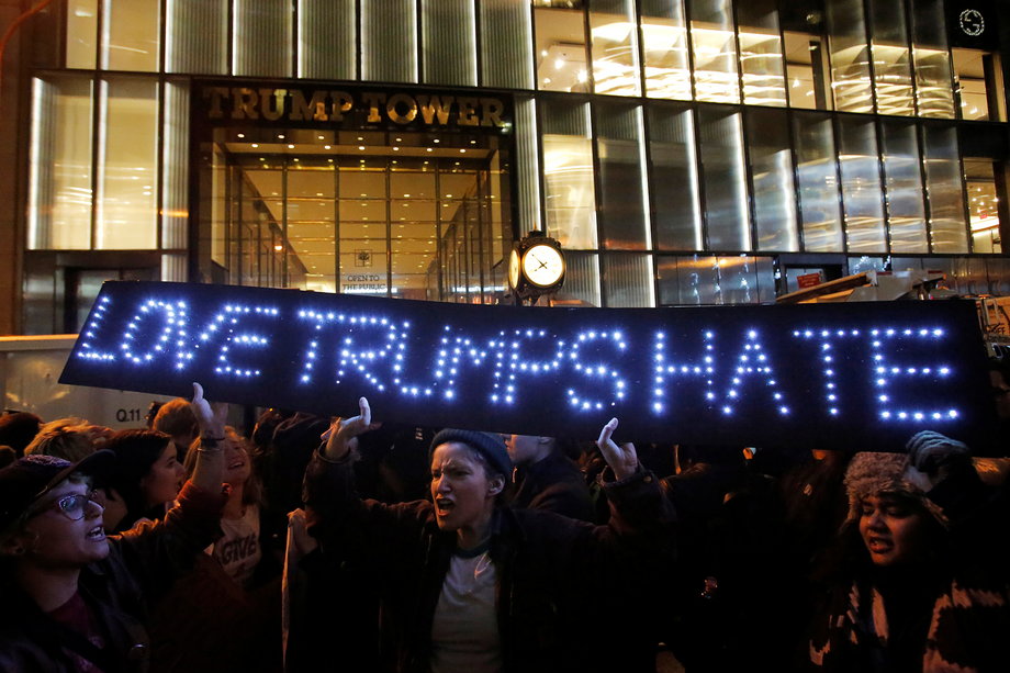 People protest outside Trump Tower following President-elect Donald Trump's election victory in Manhattan, New York, U.S., November 9, 2016.