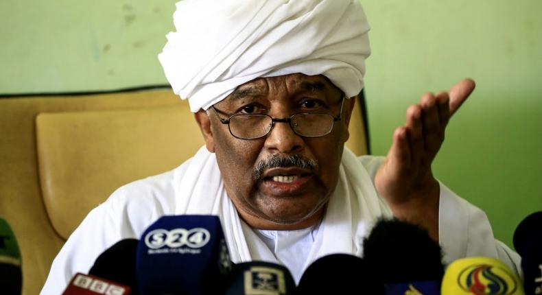 Idris Suleman, Sudan's ex-minister of international cooperation and political secretary of the Popular Congress Party, speaks during a press conference at the party's headquarters in the capital Khartoum on December 26, 2018