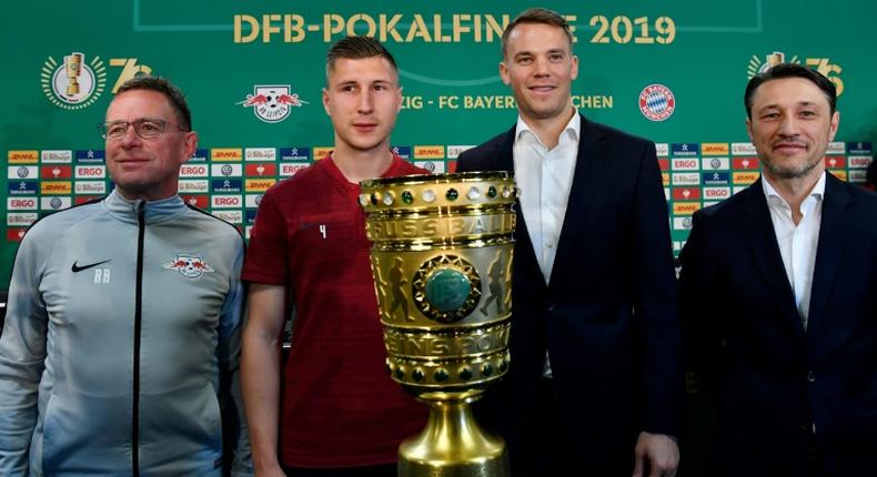Leipzig coach Ralf Rangnick and his captain Willi Orban posed with the German cup alongside Bayern captain Manuel Neu and coach Niko Kovac