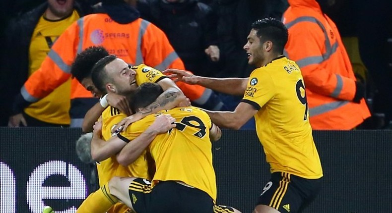 Wolves celebrate their winning goal against Chelsea