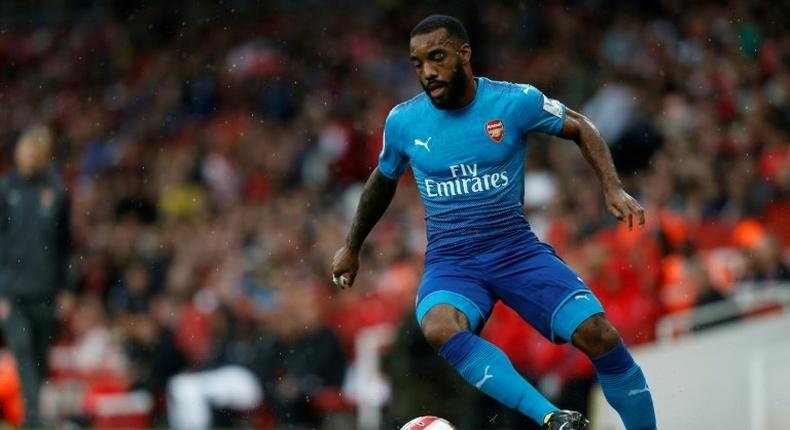 Arsenal's French striker Alexandre Lacazette controls the ball during the pre-season friendly match between Arsenal and Benfica at The Emirates Stadium in north London on July 29, 2017