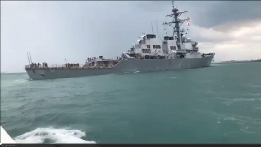 The U.S. Navy guided-missile destroyer USS John S. McCain is seen after a collision, in Singapore wa