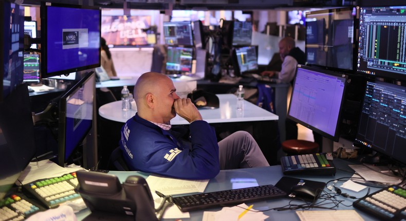 Traders work on the floor of the New York Stock Exchange during afternoon trading on November 03, 2023.Michael M. Santiago / Getty