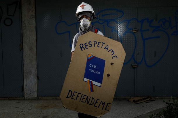 The Wider Image: Venezuela's shield-bearing protesters