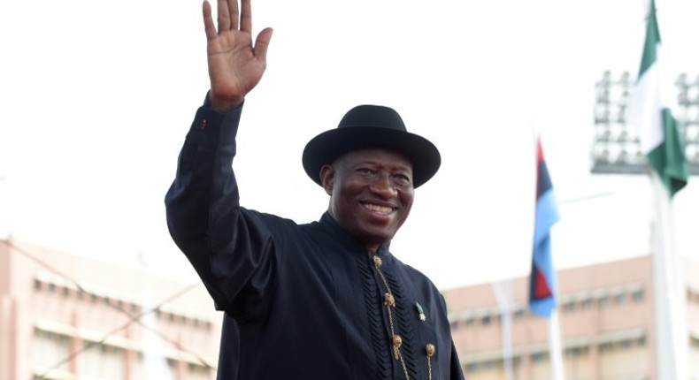 Former Nigerian President Goodluck Jonathan waves to the crowd as he leaves the office during the inauguration of President Mohammadu Buhari at the Eagles Square in Abuja, on May 29, 2015