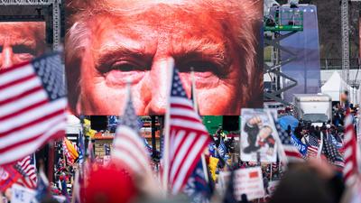 An image of former President Donald Trump appears on video screens before his speech to supporters from the Ellipse at the White House.Bill Clark/CQ-Roll Call, Inc via Getty Images