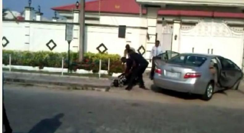 The police officers at work beating an innocent man