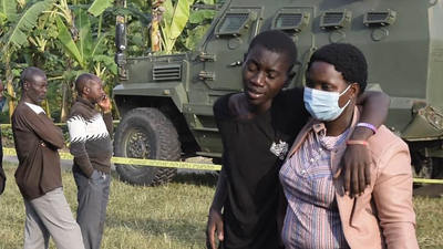 Militants kill 42 in attack on school in western Uganda.