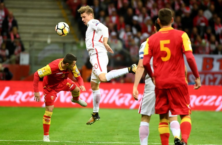 Łukasz Piszczek (C) oraz Vladimir Jovovic (L)