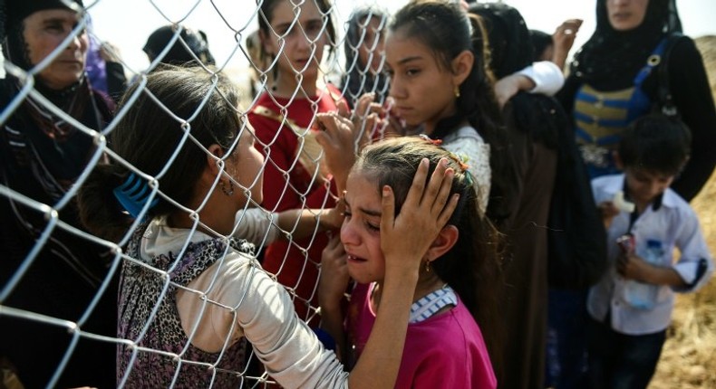 Newly displaced Iraqi's who fled from the city of Mosul, Iraq's last major Islamic State (IS) group stronghold, are reunited with their relatives who came two years ago to the refugee camp in the Khazer area