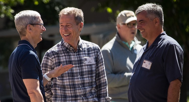 Left to right: Apple CEO Tim Cook, Time Warner CEO Jeff Bewkes, and Apple senior VP of software and services Eddy Cue