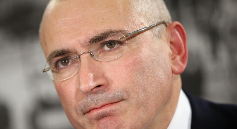 Mikhail Khodorkovsky, the former Yukos oil company chairman who was charged with embezzlement and tax evasion, speaks to the media after his release from a Russian prison.